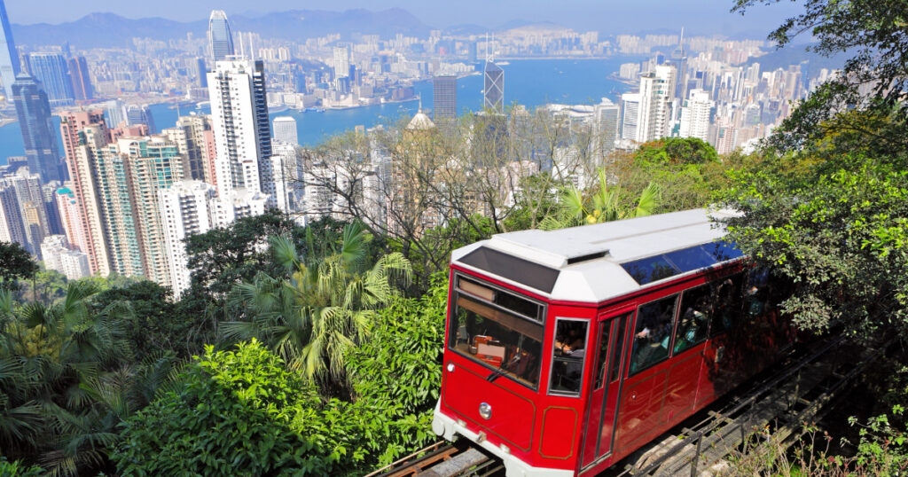 The iconic red vintage-style Peak Tram at Victoria Peak, Hong Kong for Navigator of the Seas, Tokyo to Tropic Sailing.